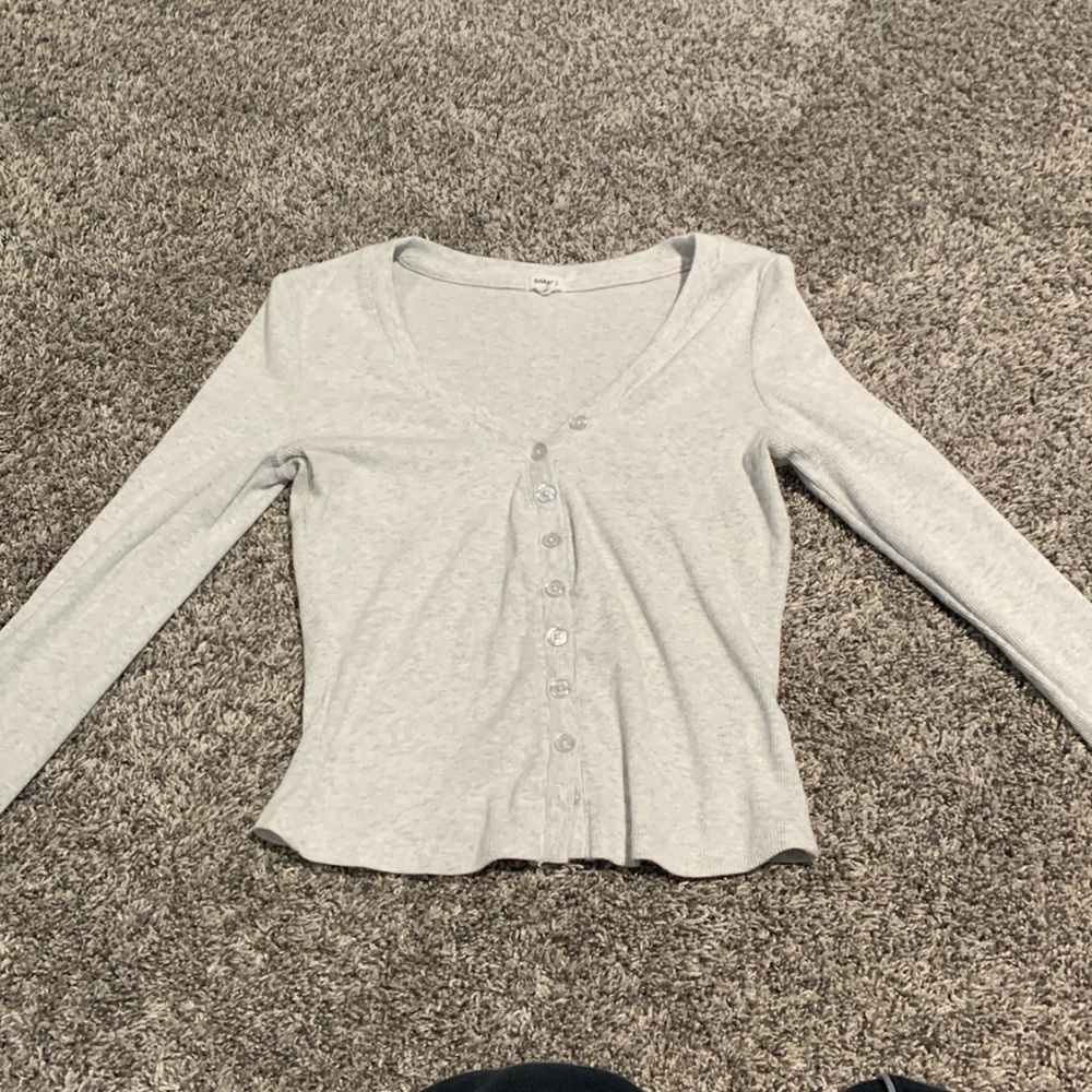 light grey long sleeved
